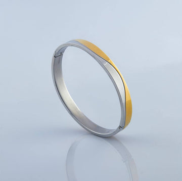 Oval dual finish bracelet with platinum and gold plating