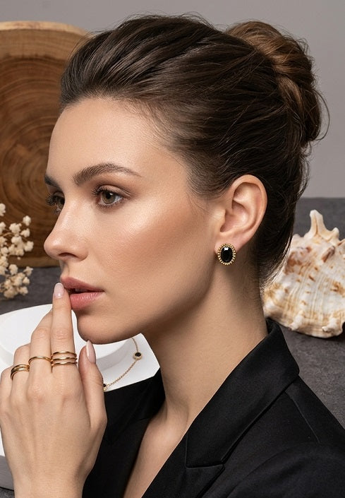 Elegant Oval Black Stone Stud Earrings with Beaded Gold-Tone Edge