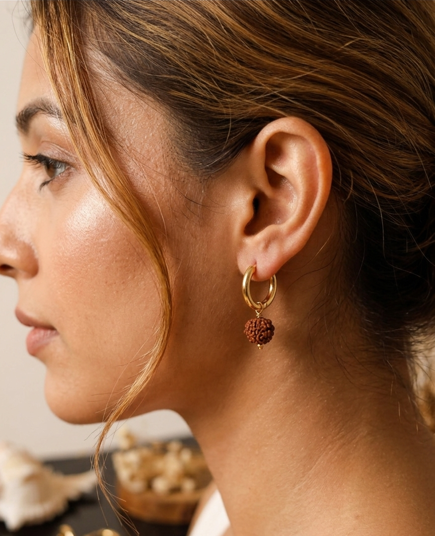 Spiritual & Stylish Gold-Tone Huggie Hoops with Rudraksha Bead