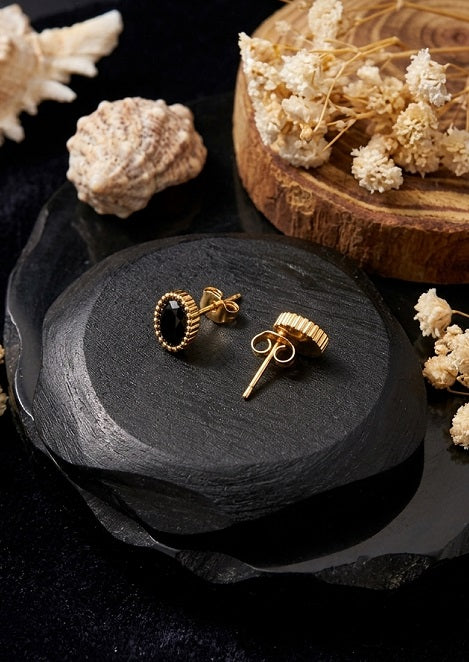 Elegant Oval Black Stone Stud Earrings with Beaded Gold-Tone Edge