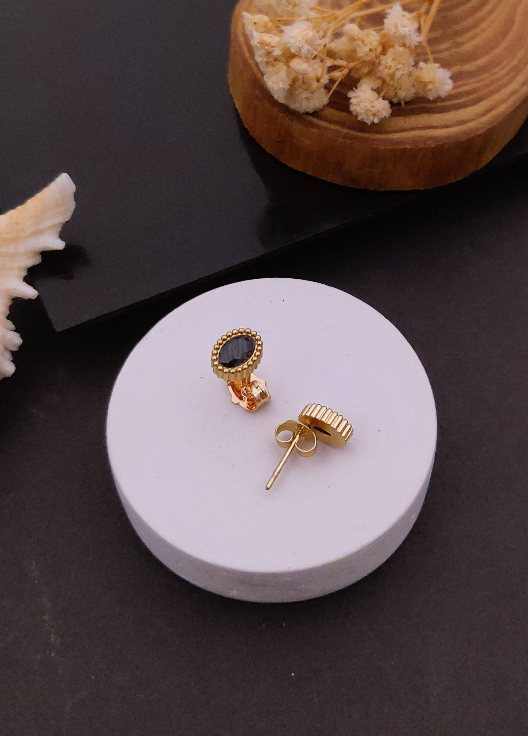 Elegant Oval Black Stone Stud Earrings with Beaded Gold-Tone Edge